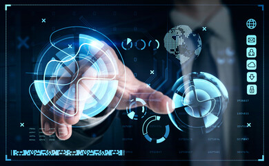 Businessman is touching screen of digital interface with his finger