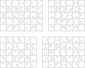 Set of four white puzzle, separate pieces 