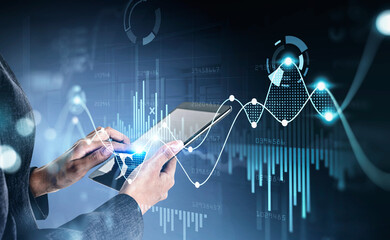 Businesswoman using digital tablet device, stock market changes, business graph bar chart. Double exposure of blue white white lines, growing numbers. Concept of online trading and technology