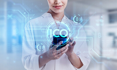 Smiling businesswoman hands using smartphone researching ICO rep