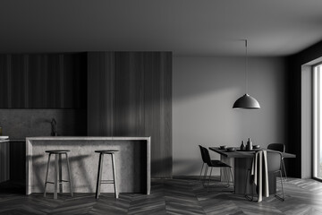 Grey kitchen interior with table and chairs on parquet floor