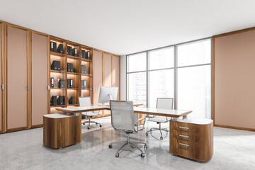 Light business consulting room interior with furniture and window