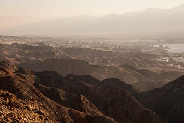 Arid desert mountains against the backdrop of the Red Sea. Shlomo mountain, Eilat Israel. Morning Daylight . High quality photo