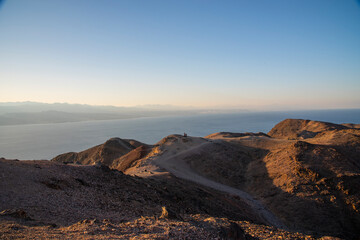 Arid desert mountains against the backdrop of the Red Sea. Shlomo mountain, Eilat Israel. Morning Daylight . High quality photo