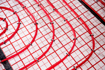 Water heating system and underfloor heating system