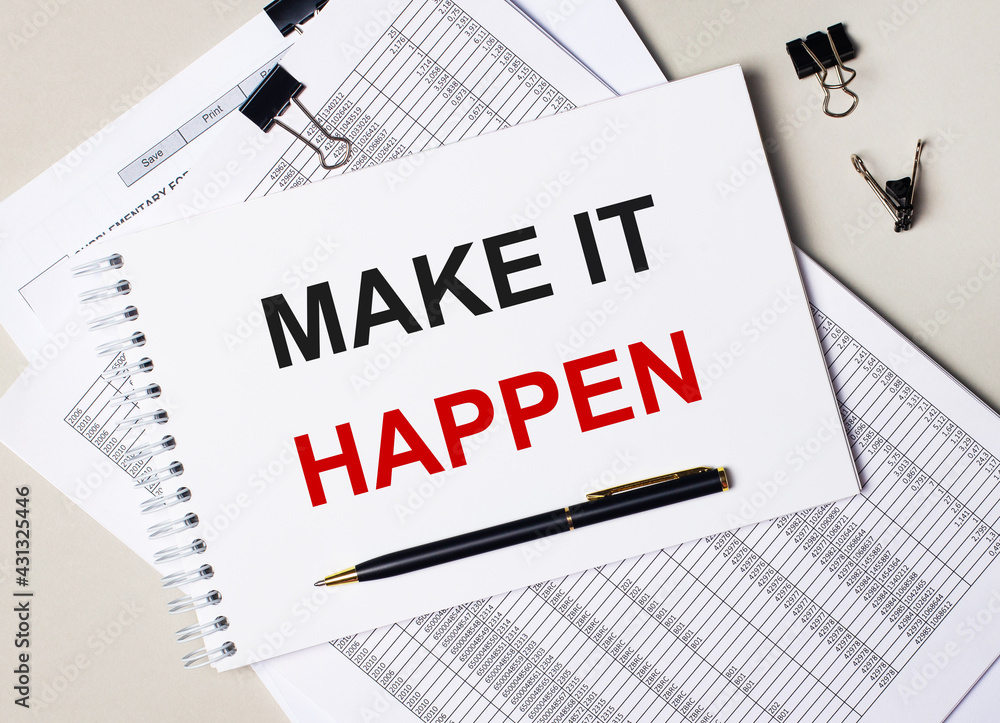 Poster on the desktop there are documents, pen, black paper clips and a notebook with the text make it happ