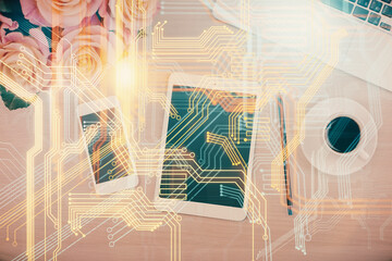 Double exposure of map hologram drawing over desktop. Top view. International connection concept.