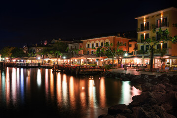 night view of the town Italy at seaside (garda lake)