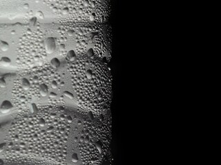 Cold steam clings to the water bottle.