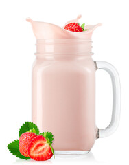 strawberry falling in mason jar of yogurt with splash