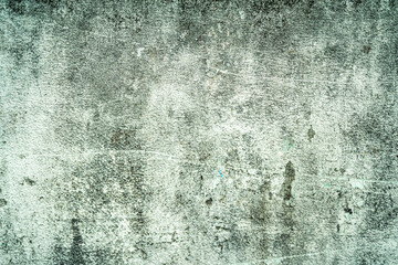 Texture of old stones of various forms with seams. Close up of shabby masonry. Stone wall from uneven different ancient friable cobblestones.