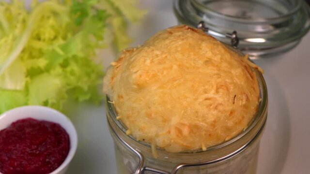 Beef pie recipe with red beet sauce cooked with chili spices and salad