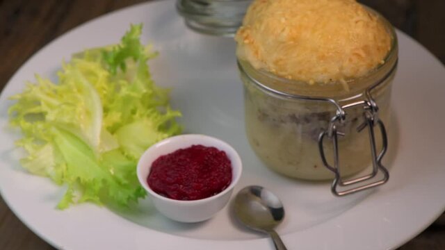 Beef pie recipe with red beet sauce cooked with chili spices and salad