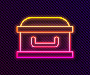 Glowing neon line Coffin with christian cross icon isolated on black background. Happy Halloween party. Vector