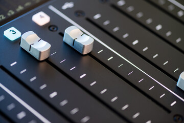 Professional podcast mixing console with faders and adjusting buttons, Audio sound mixer console....