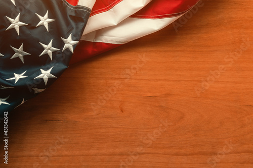 USA flag on wooden background with copy space for the Independence Day, 4th of July