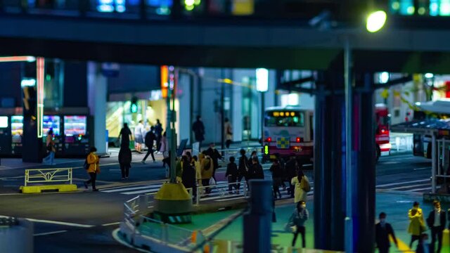A night timelapse of the miniature neon street near Shibuya station tiltshift