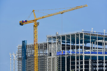 Large construction site with construction cranes