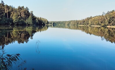 Early morning, blissful silence on the lake in Mazury. - obrazy, fototapety, plakaty