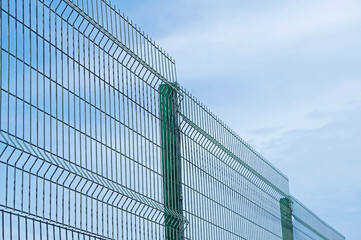 Fototapeta na wymiar industrial fencing made of heavy duty metal wire