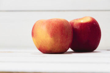 Apple put on wooden timber board,