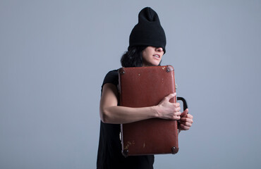 woman with suitcase. Emotion woman face. Sensual. Work.
