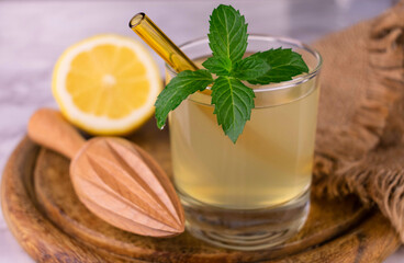
A glass of fresh lemon juice in a glass. Close-up.