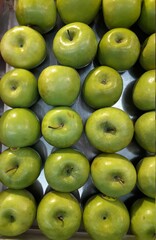 green apples are sold in the market