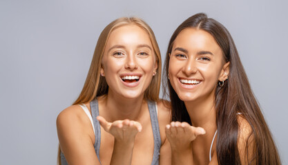 Portrait of two cheerful young women