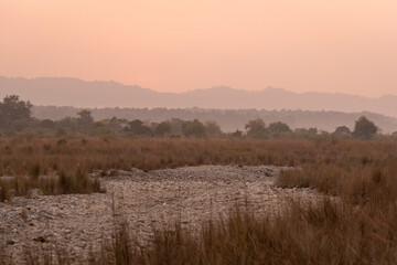 scenic landscape view of Ramganga River and mountains at dhikala zone of corbett national park or tiger reserve uttarakhand india