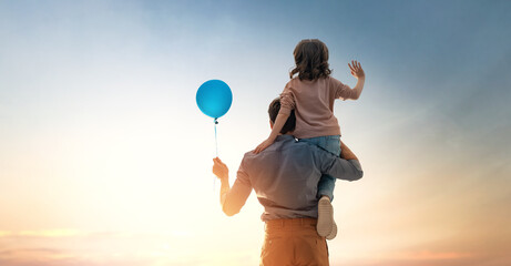 Father and his daughter outdoors