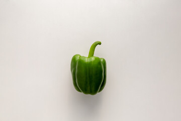 Green pepper on white background