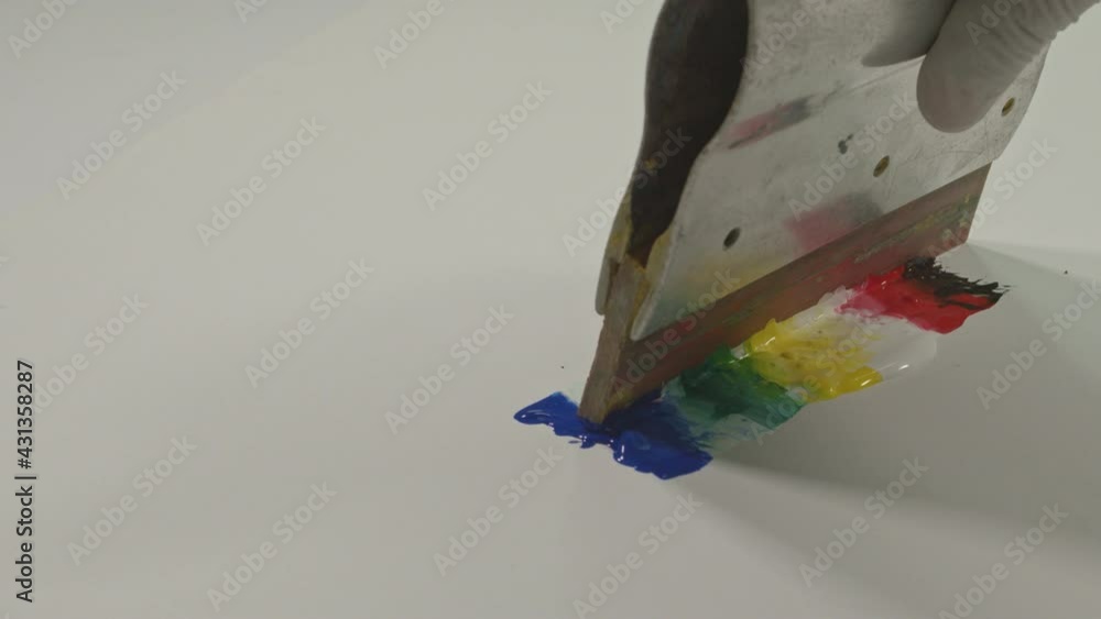 Poster top view use a color spatula to blend the colors together and wipe the colors to get a softer color 