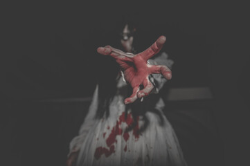 Portrait of asian woman make up ghost,Scary horror scene for background,Halloween festival...