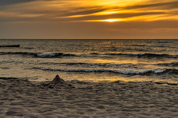 The setting sun at the beach in Ahrenshoop, Mecklenburg-Western Pomerania, Germany