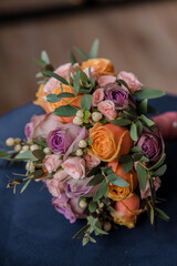 Wedding beech. Bouquet in the hands of the bride.
