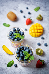 Rainbow fruit salad in a glass