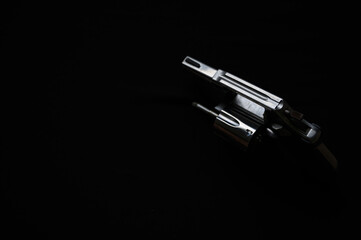 The compact revolver gun, Revolver Pistol on black background.
