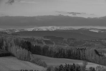Sunset view in Roprachtice village in Krkonose mountains with color sky
