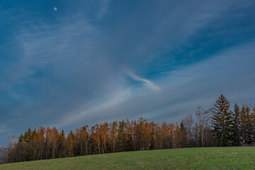 Sunset view in Roprachtice village in Krkonose mountains with color sky
