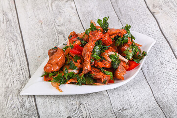 Marinated chicken breast slices with cilantro