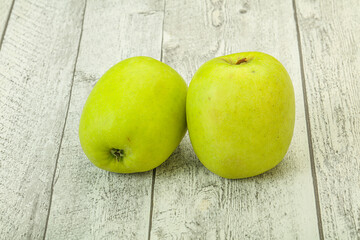 Two ripe green sweet apples