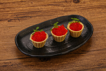 Apetizer - tartlet with red caviar