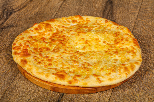Georgian cuisine - round khachapuri with meat
