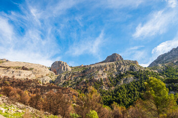 Natural landscape of the mountains in the interior of the province of Alicante (Spain), on a day with some clouds.