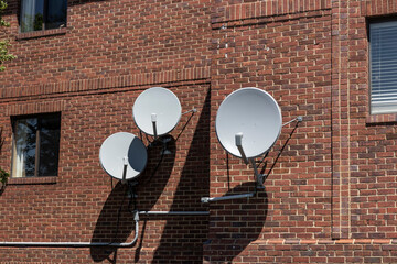 Satellite dishes in various sizes and shapes waiting for television, data or internet signals.