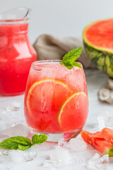 A watermelon drink watermelon, lemon, lime, mint and ice