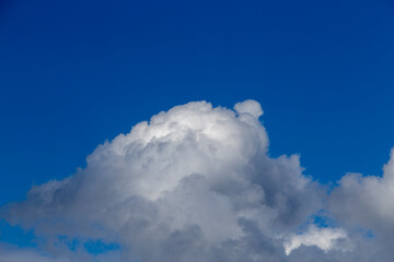 Blue sky detail and clear clouds. Thunderstorms probabilities. 