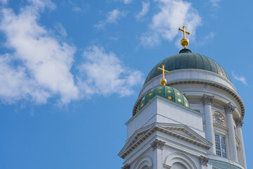 The towers of the cathedral in Helsinki against the blue sky.