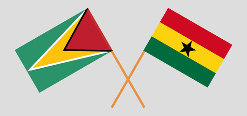 Crossed flags of Guyana and Ghana. Official colors. Correct proportion